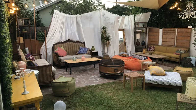 a living room with a white tent