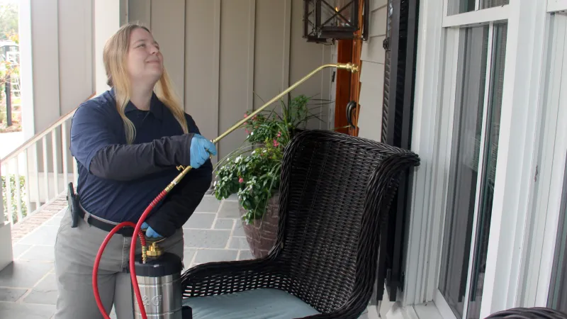 a person holding a hose