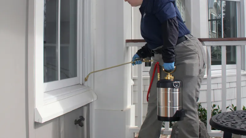 a man holding a hose