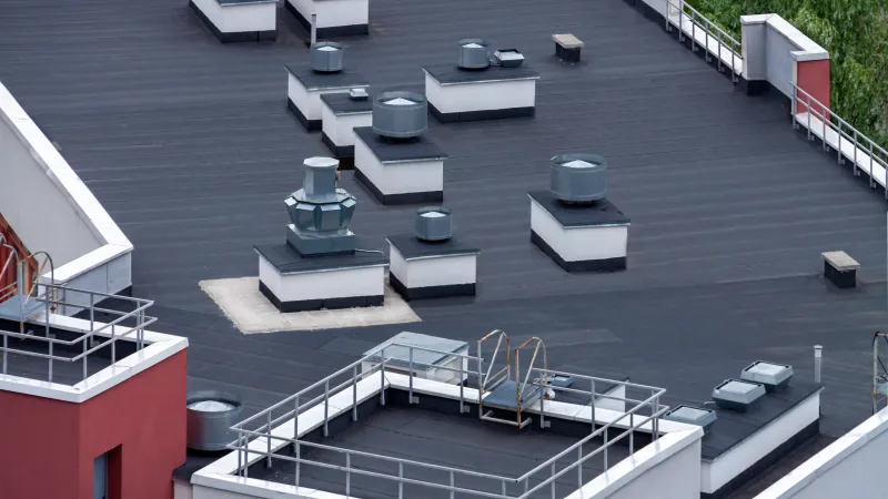a roof with chairs and tables