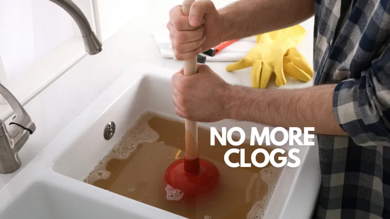 a person unclogging a sink