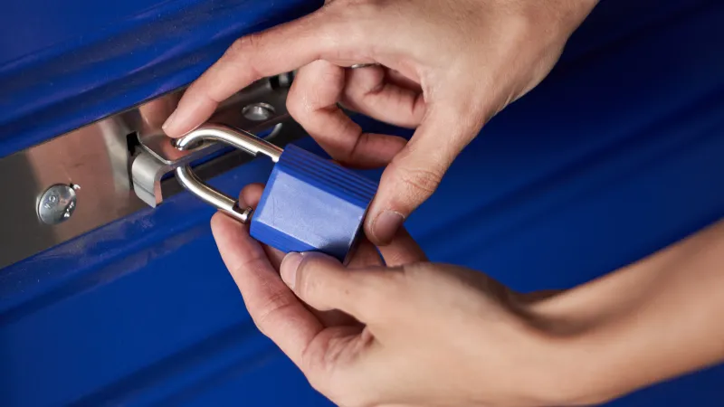 a close-up of hands holding a key