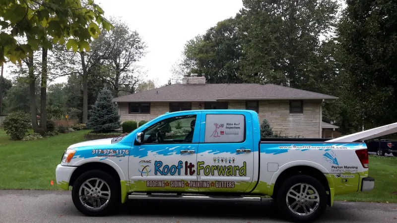This amazing bedford stone home received a roofing makeover by Roof It Forward.