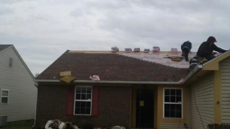 You can see that the Pro Armor synthetic underlayment has been installed, and the crew is working their way to the top of the ridge.