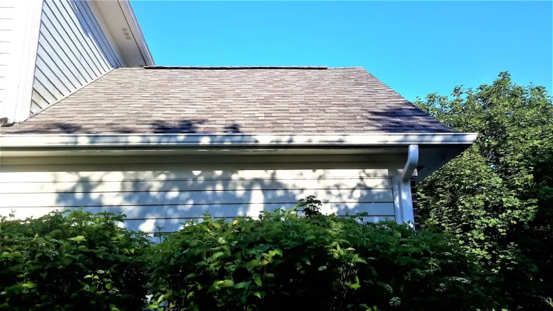 All items used are part of the Owens Corning roofing system, including the shingles and matching ridge caps. All roof penetrations are custom painted to match the roofing system color for that added special touch.
