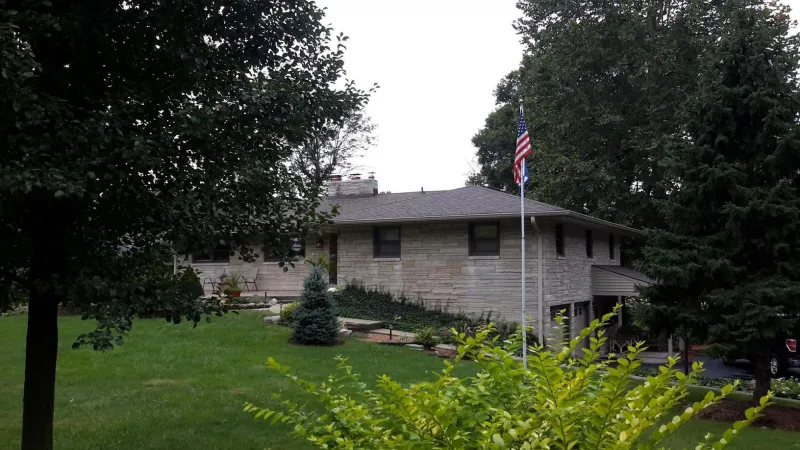 These Owens Corning Duration Shingles are in the Teak color.