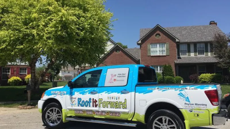 The Colonial Slate colored Duration shingles nicely complement the home.