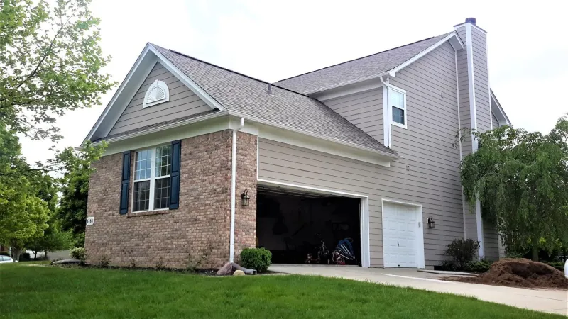 This roof is utilizing the Owens Corning Duration Shingles in the Driftwood color. Thanks to their SureNail Technology, these shingles are warranted for up to 130 mph wind gusts. They also add great dimension to your home.