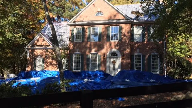 This is a installation photo with landscaping taped.