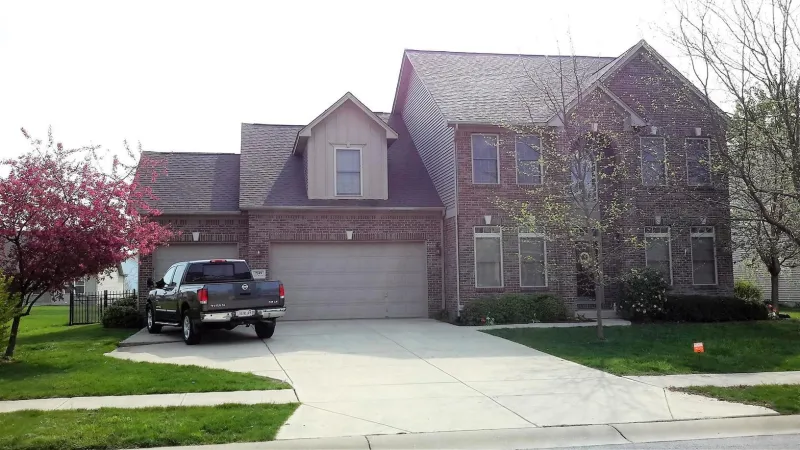 This home now has an eye-catching curb appeal with its newly completed roofing system, topped with Duration shingles.