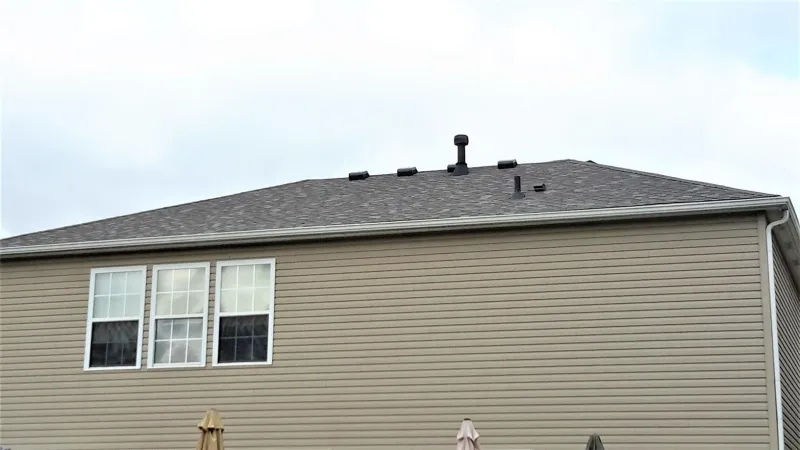 We installed a matching ridge cap shingle that is designed to be just that ridge cap shingle. The Owens Corning ProEdge ridge cap is the icing on the cake.