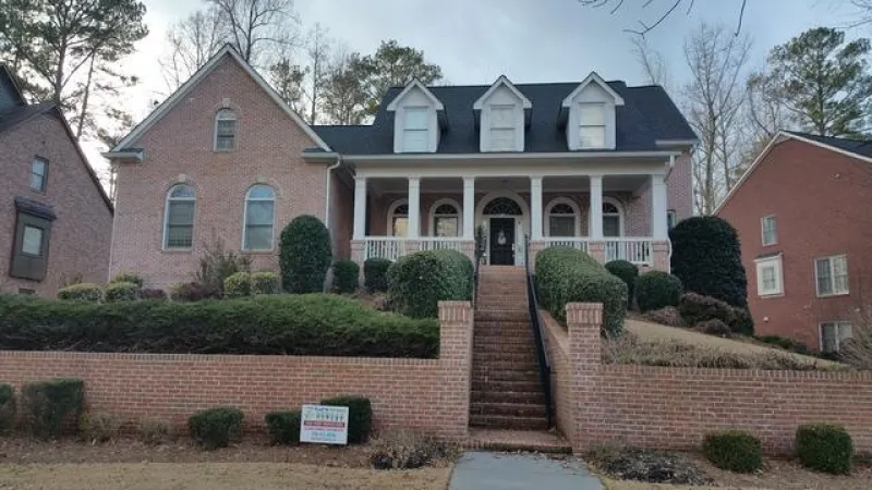 Completed project show casing the beautiful Owens Corning Duration (Onyx Black) Shingles with SureNail Technology.