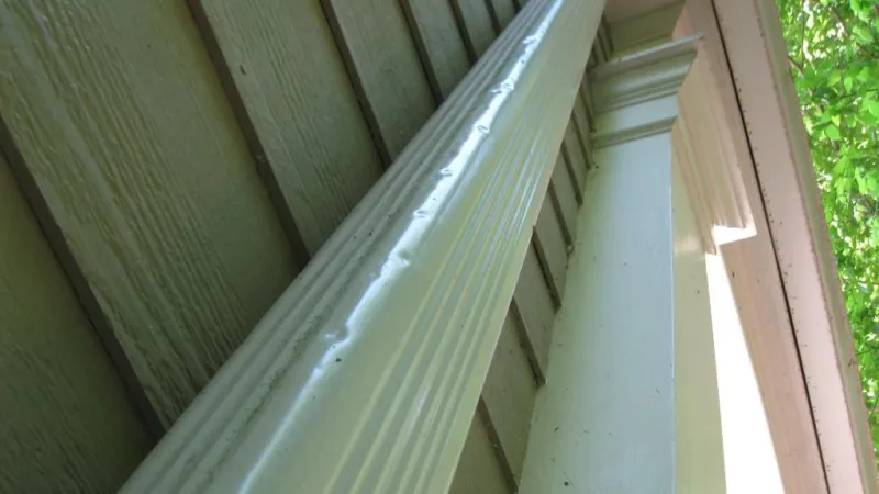 Look at these downspout dents from hail in Marietta, GA. When you see dented downspouts or gutters, the roof will likely be damaged as well.