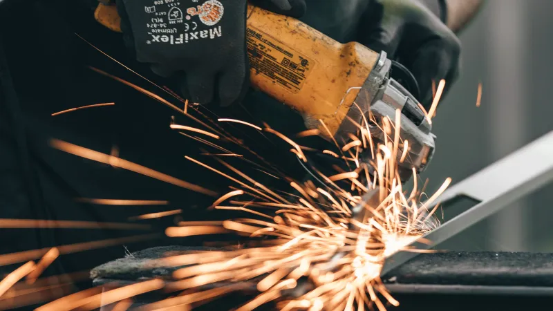 a man working on metal