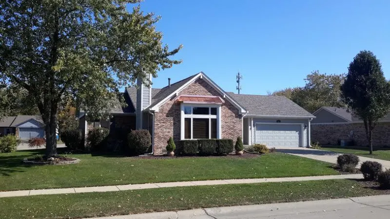 This house has a whole new look with a new Duration shingle roof and the copper roof addition.