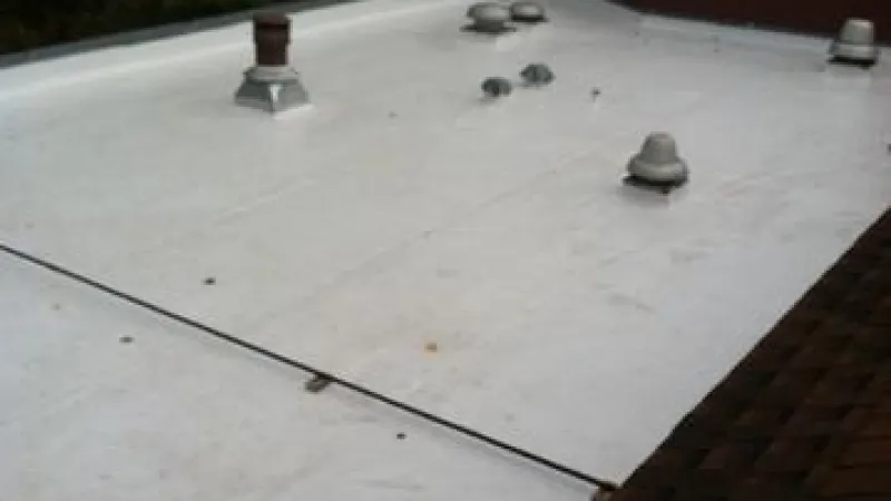 Picture of a brand new TPO roofing system. Looks great!