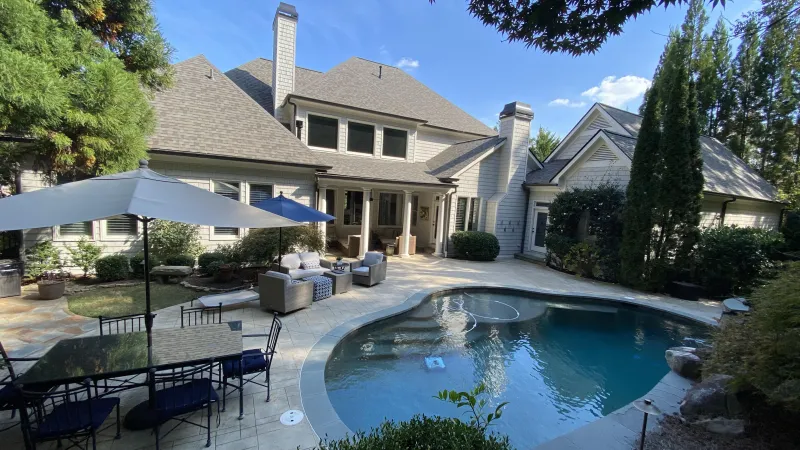 Owens Corning Roof Install in Canton, GA with pool in the back yard by ARAC Roof It Forward