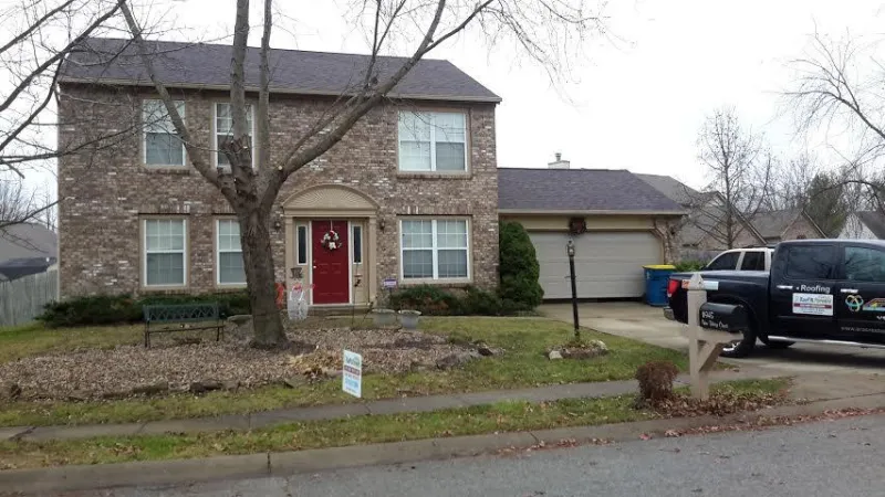 Owens Corning Duration shingles in the Merlot color. The dimensional design brings out all of the features of the home.
