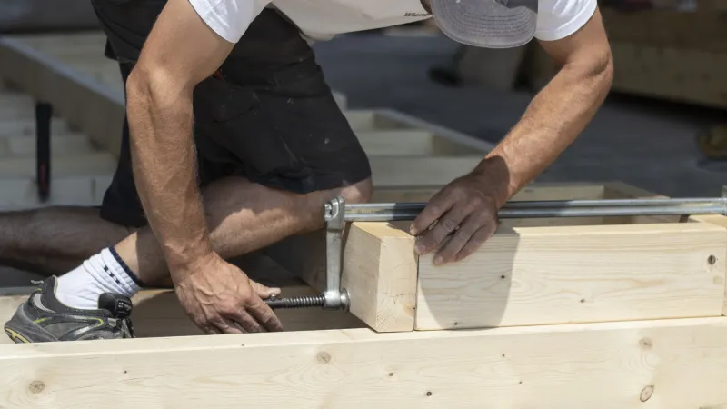 man working with wood