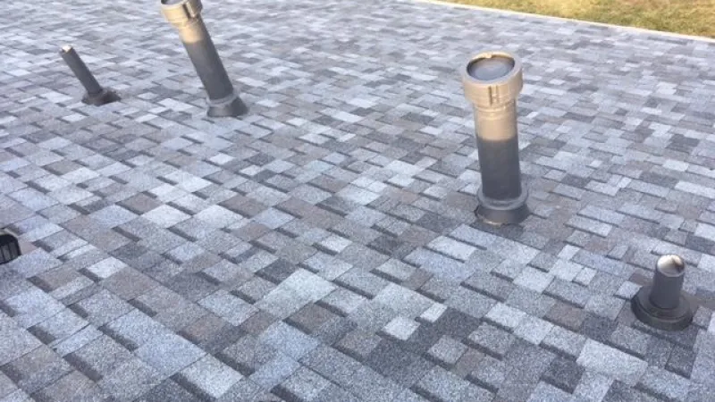 All items used are part of the Owens Corning roofing system, including the shingles and matching ridge caps. All roof penetrations are custom painted to match the roofing system color for that added special touch.