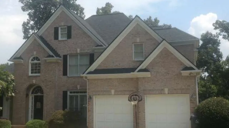 Beautiful new roof using Owens Corning Oakridge TruDef (Onyx Black)