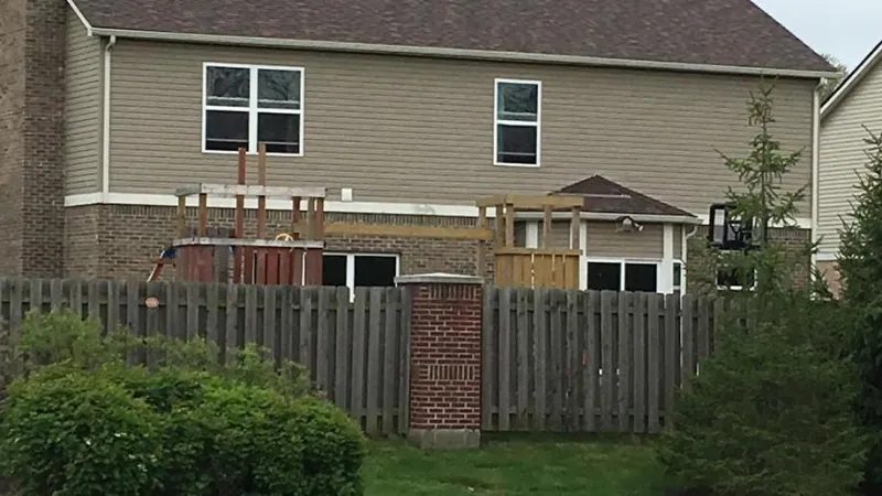 These gorgeous Duration shingles are in the Brownwood color and add great dimensions to this home.