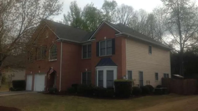 The project has been completed using GAF Timberline HD Weathered Wood