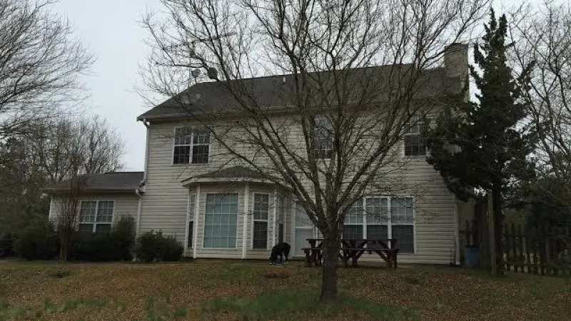 This before photo shows how dated the shingle design is.