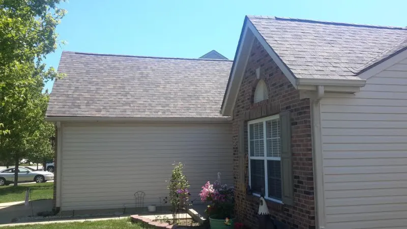 The old three-tab shingle was removed, and this amazing dimensional shingle took over.