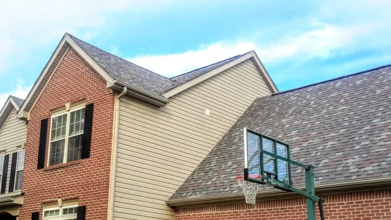 This completed roofing system utilizes the Owens Corning Duration Shingles in the Colonial Slate color. Due to the shingle's SureNail Technology, it is warranted for up to 130 mph wind gusts.
