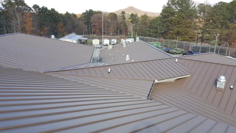 Showing the amazing Standing Seam Seal brown roof installed.