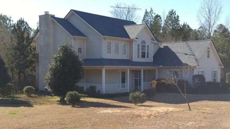 The installation of the Duration shingles, new aluminum trims and high profile ridge caps, makes this home appear to be brand new. The color of the shingles is the Pacific Blue.