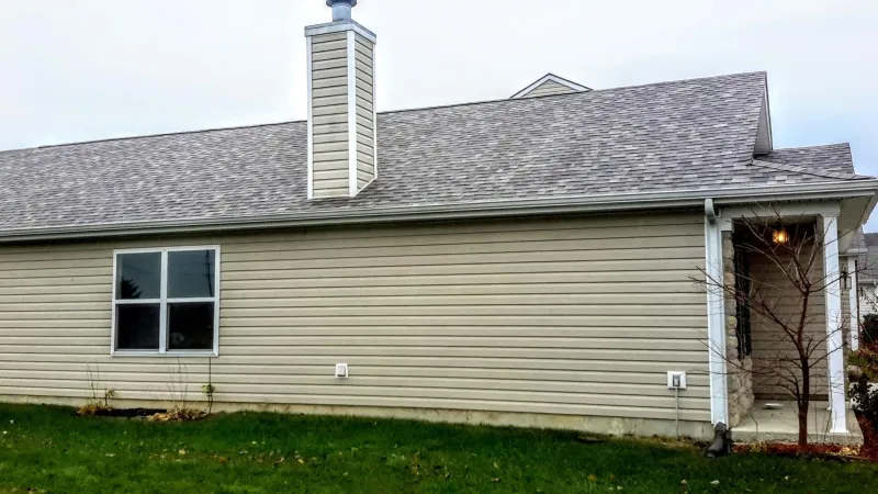 With over 20 colors to choose from, the Duration shingle is your perfect chance to match your roof to your home's exterior. This color is Sand Dune.