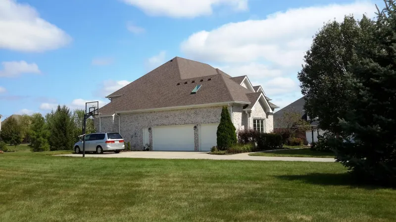 These shingles, along with the shadow line work together to give the home beautiful dimensions.