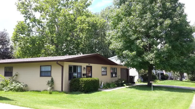 The Mastic Ovation Siding in the Corn Silk color make this home the jewel on the street.