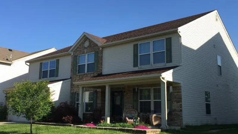 The dimensional appearance of the Duration shingle adds dramatic curb appeal to this home.