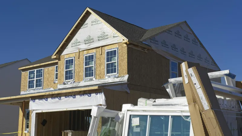 a house with a sign on the roof