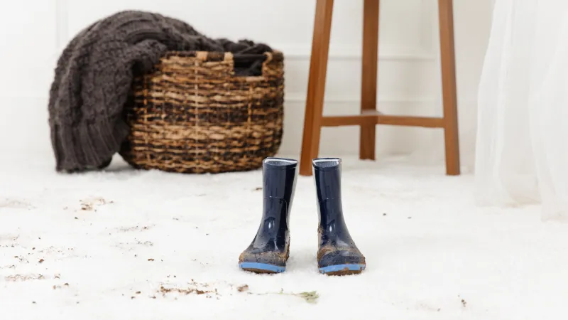 a pair of boots and a basket