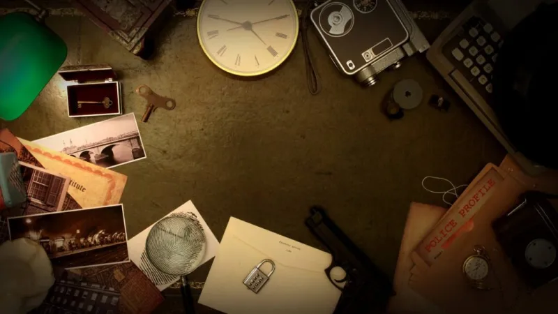 a clock and other objects on a table