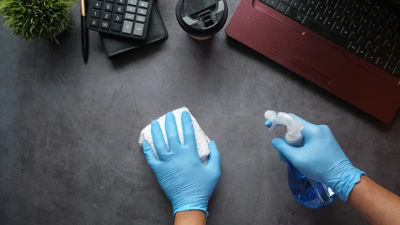 a person wearing gloves and gloves