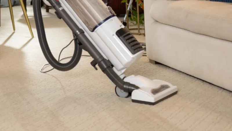 vacuuming carpets after professional carpet cleaning