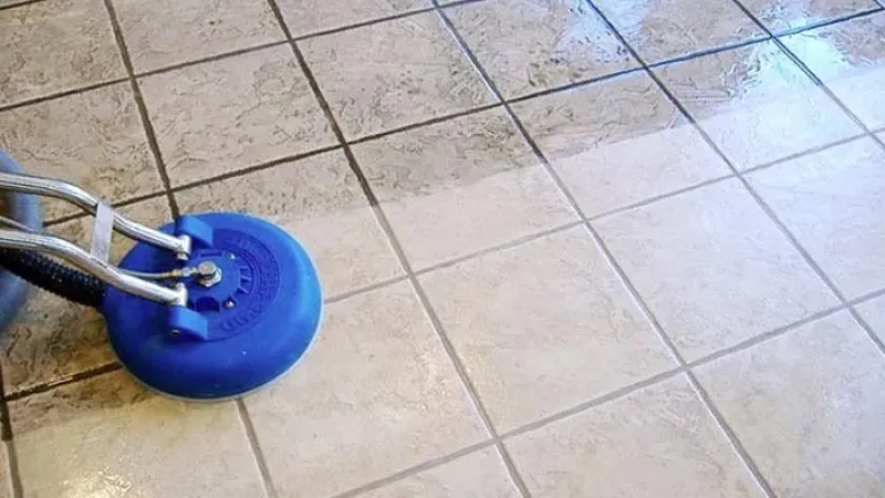 a blue bicycle on a tile floor