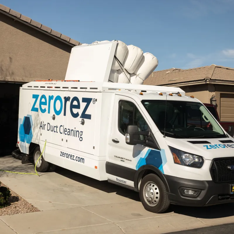 Zerorez air duct cleaning van in front of home