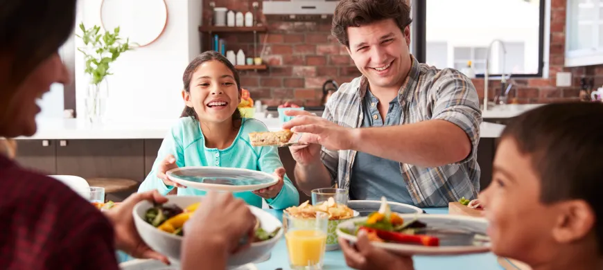 a family eating at a table.