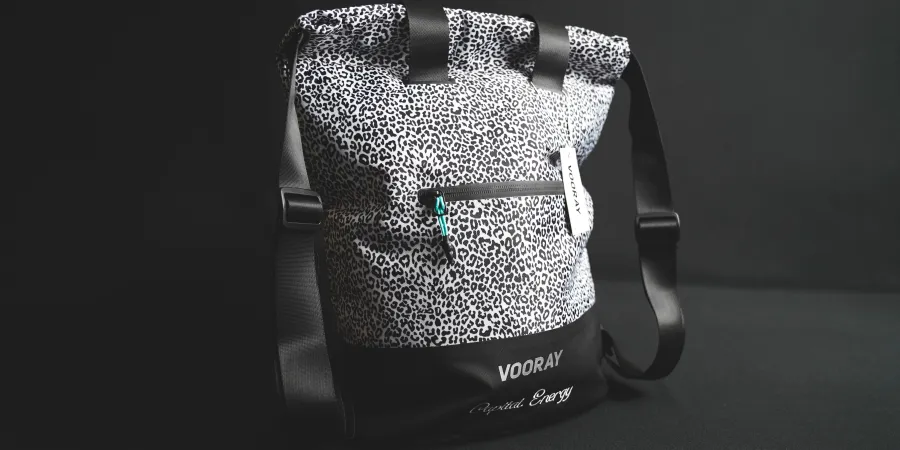 a black bag with a white logo
