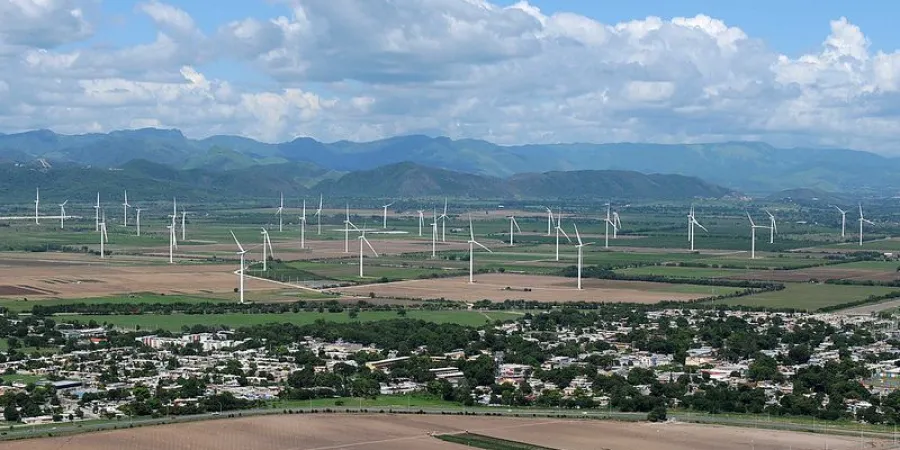 a landscape with windmills