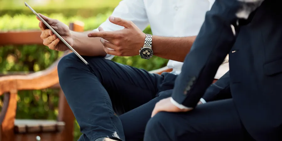 a man sitting on a bench