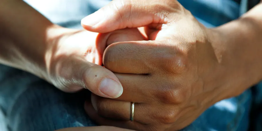 a close up of a hand holding a cellphone