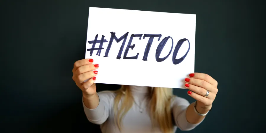 a person holding a sign