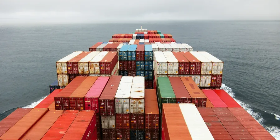 a large group of containers on a ship